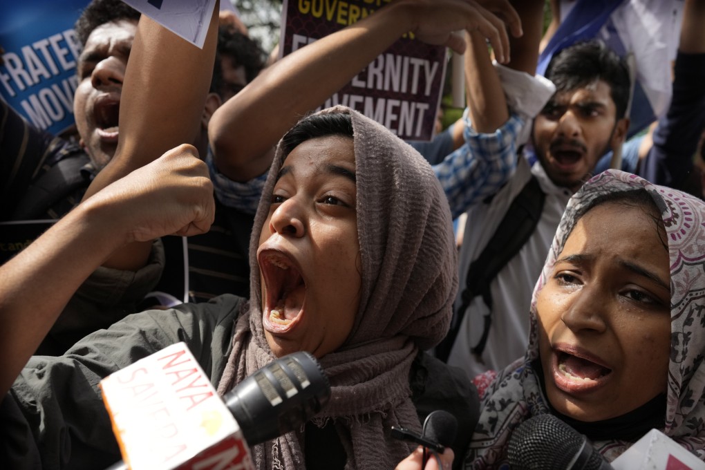 Muslim students shout anti-government slogans during a protest in New Delhi last year against the persecution of Muslims and demolition of their houses. Photo: AP