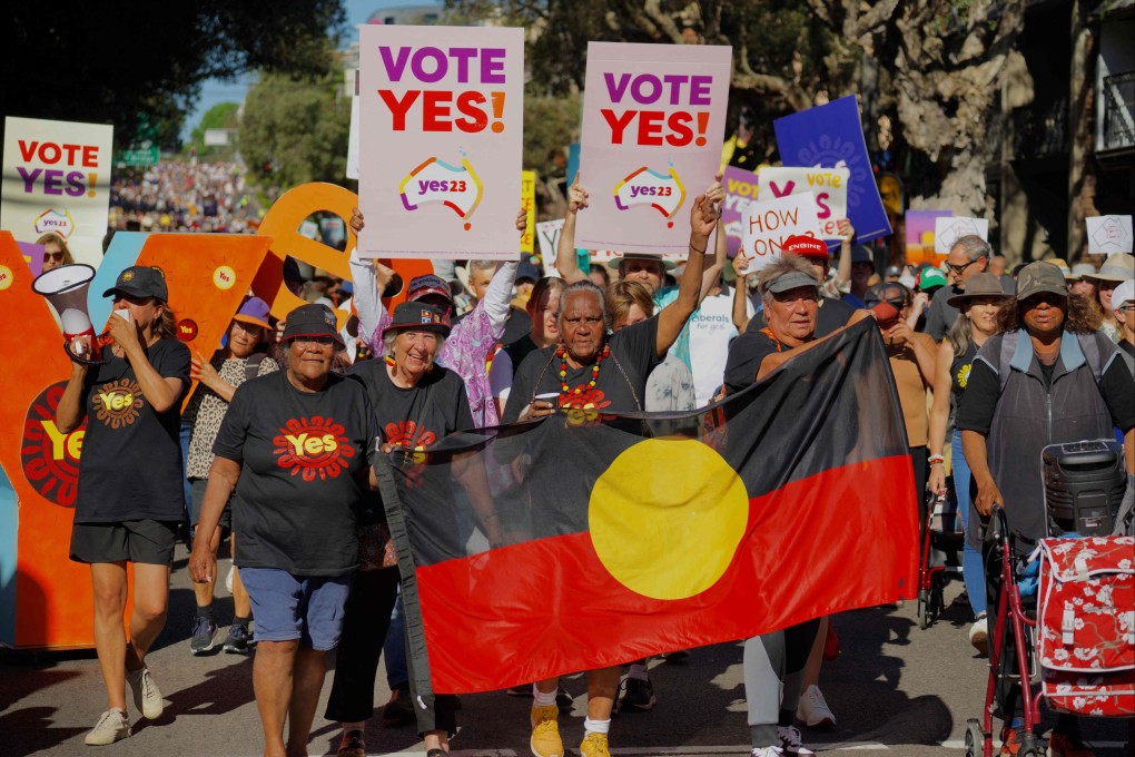 People take part in a “Walk for Yes” rally in Sydney, ahead of the referendum that could grant indigenous Australians a constitutionally enshrined right to be consulted on policies that affect them. Photo: AFP