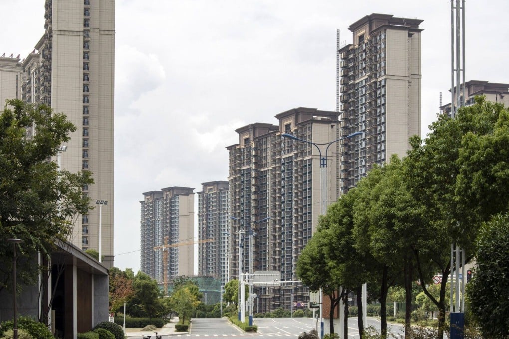 Residential buildings under construction at the Tao Yuan Tian Jing project, developed by China Evergrande Group, in Yangzhou, China. Source: Bloomberg