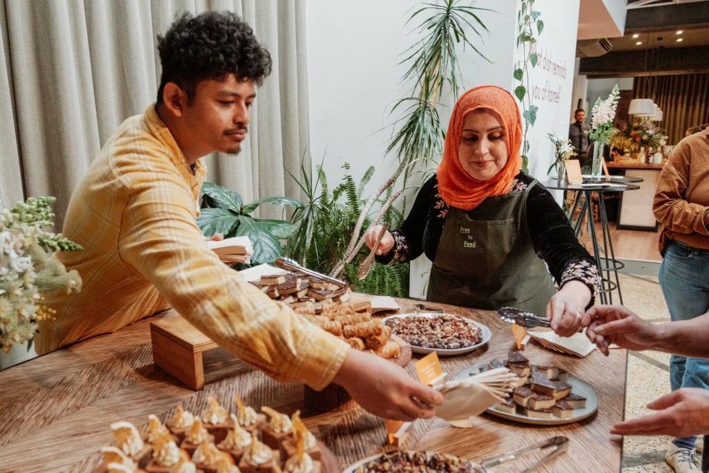 Participants at a shared food experience at Free to Feed. The founder of the Melbourne social enterprise talks to the Post about how her organisation is helping give refugees “new beginnings” through training and work opportunities. Photo: Free to Feed