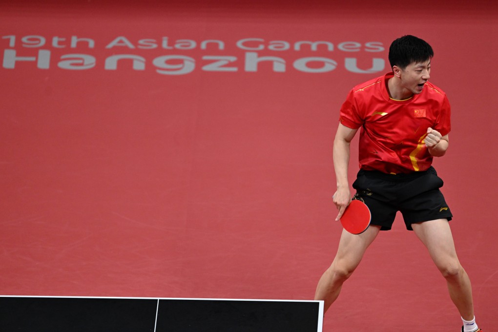 Ma Long celebrates a point during the China men’s team gold medal match against South Korea. Photo: Xinhua
