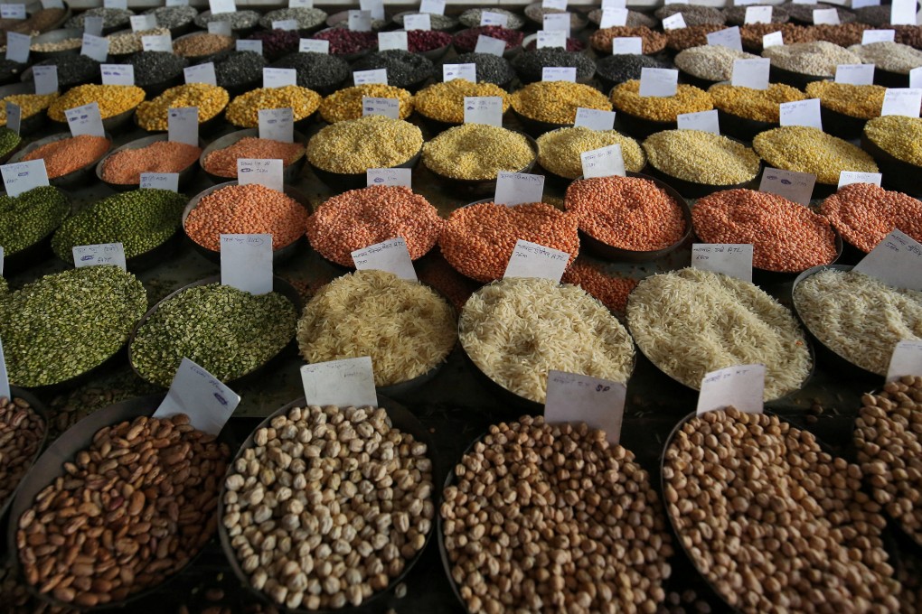 Price tags are displayed on bags of rice and lentils at a wholesale market in New Delhi. Photo: Reuters