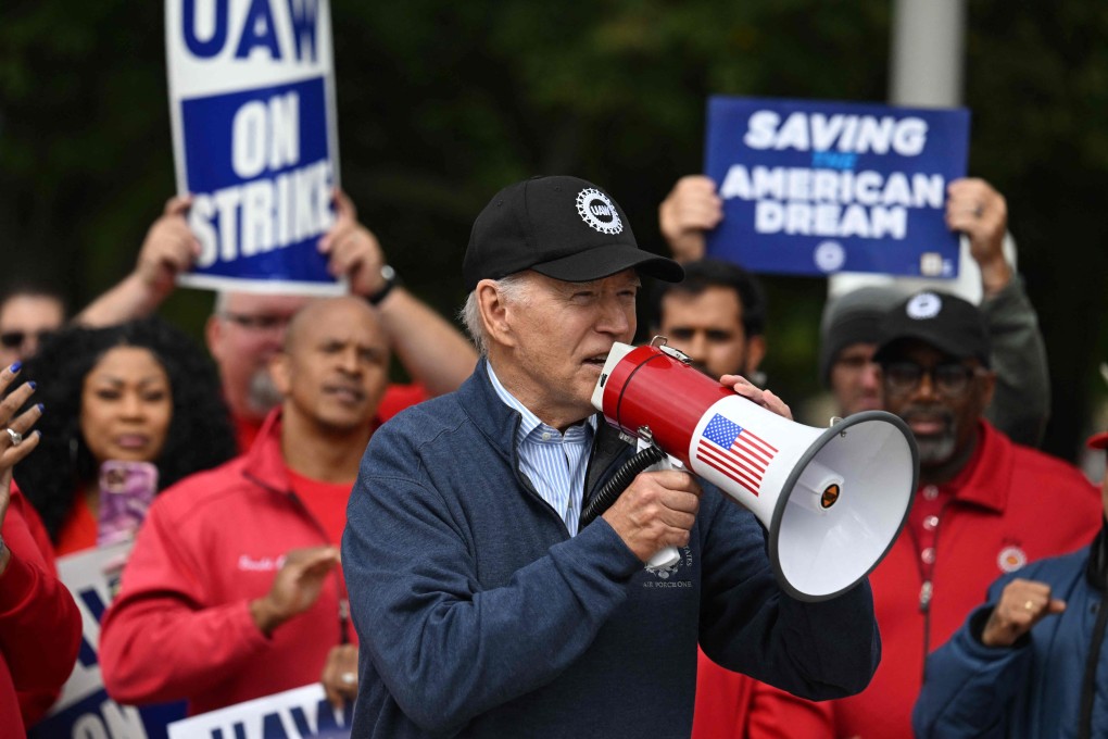 US President Joe Biden addresses striking members of the United Auto Workers union at a picket line outside a General Motors Service Parts Operations plant in Belleville, Michigan, on Tuesday. Photo: AFP