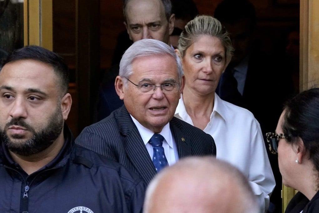 US Senator Bob Menendez (centre) and his wife, Nadine, leave court in New York on Wednesday. Photo: AFP