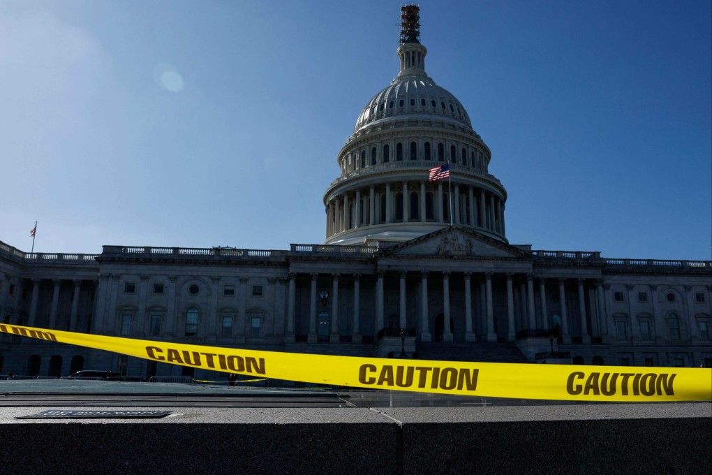Caution tape blows in the wind on the east front plaza of the US Capitol on Wednesday. Photo: AFP