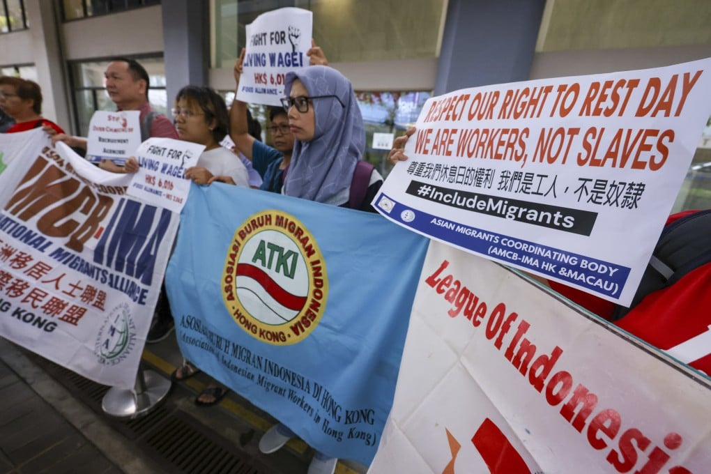 Members of the Asian Migrants Coordinating Body meet the media after talks with the Labour Department for the annual wage review consultation, in Sheung Wan on August 9. Photo: May Tse
