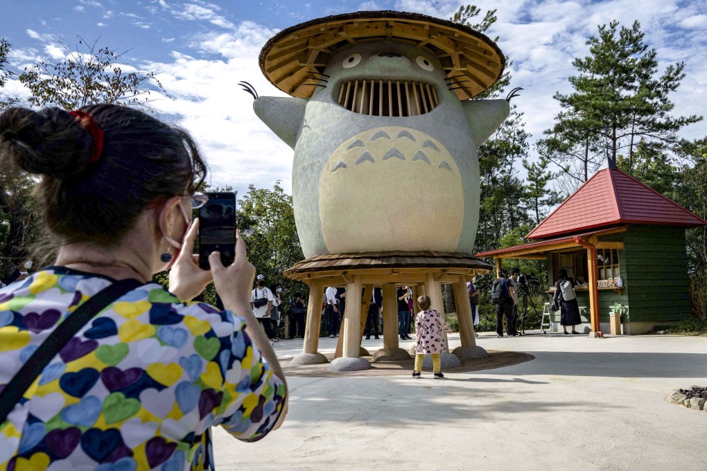 People take pictures of the ‘Totoro’ character at Ghibli Park in Aichi prefecture. Photo: Studio Ghibi/AFP