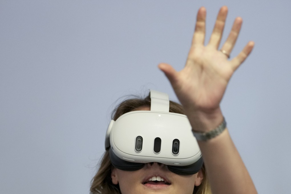 An attendee tries the Meta Quest 3 at the Connect developer conference in Menlo Park, California, on Wednesday. Photo: AP Photo