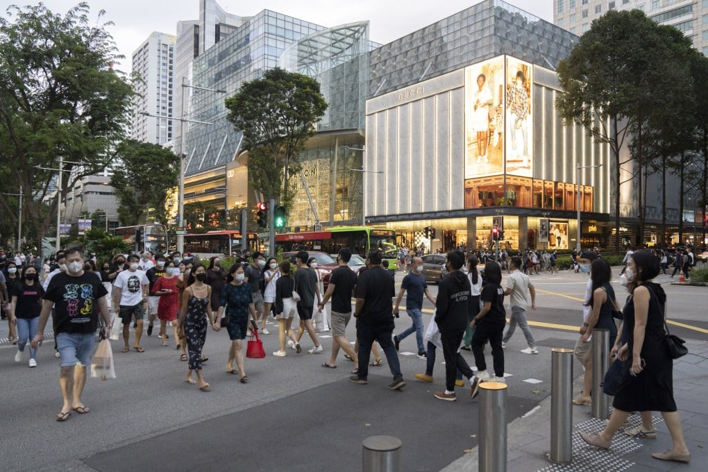 Shoppers on Orchard Road in Singapore. Photo: Bloomberg