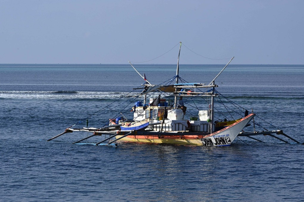 A Philippine fishing boat is anchored near the Chinese-controlled Scarborough Shoal in the disputed South China Sea. Photo: AFP