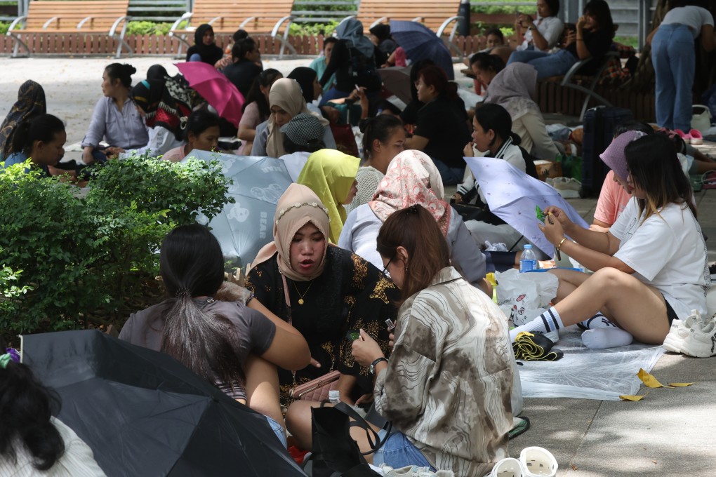 Domestic workers relax on their day off in Hong Kong. Photo: Edmond So