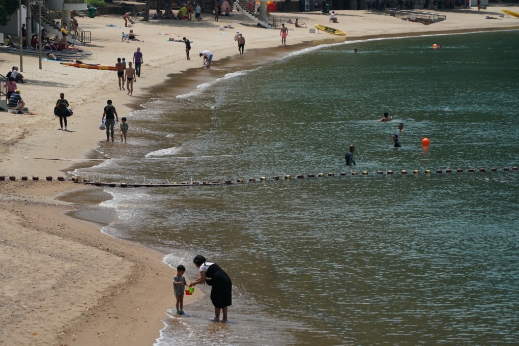 Residents enjoy the sun and sea at Deep Water Bay on May 5, 2022. Photo: Felix Wong