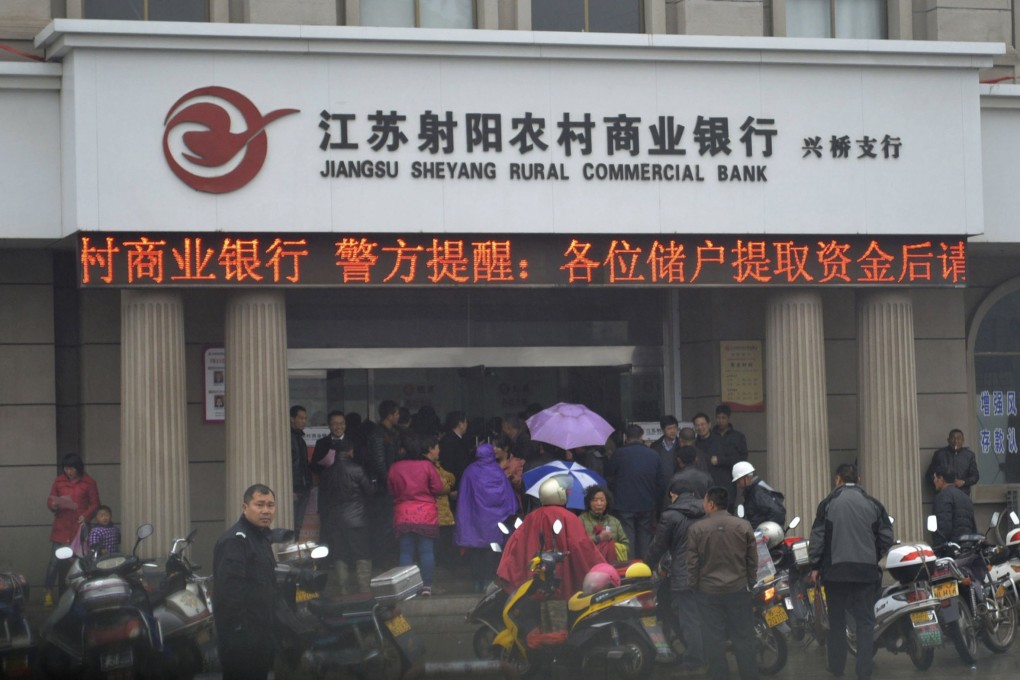China’s small lenders have been plagued by poor governance, fraud and weak balance sheets in recent years. Photo: Reuters