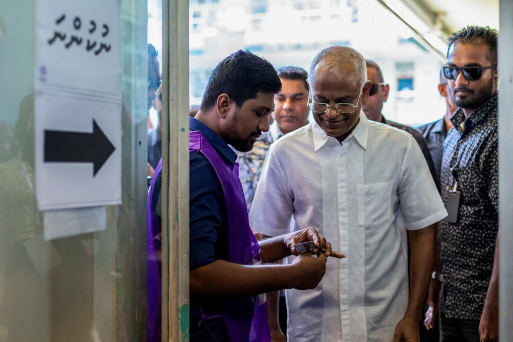 Maldives President Ibrahim Solih arrives to cast his vote during the second round of a presidential election on Saturday. Photo: Reuters