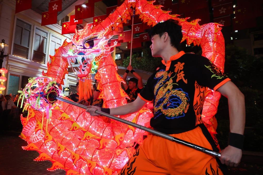 An LED Fire Dragon Fiesta on Lee Tung Avenue in Wan Chai adds to the vibrant atmosphere of the Mid-Autumn Festival. Photo: Edmond So