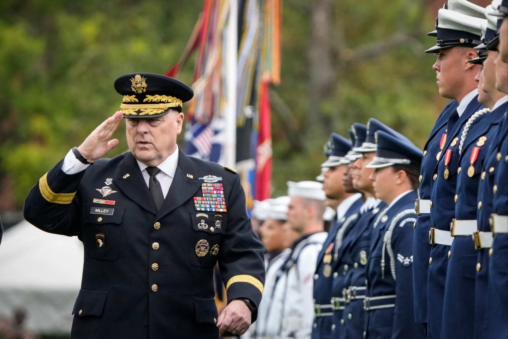 Outgoing Chairman of the Joint Chiefs of Staff General Mark Milley inspects the troops in Arlington, Virginia, on Friday. Photo: Getty Images via AFP