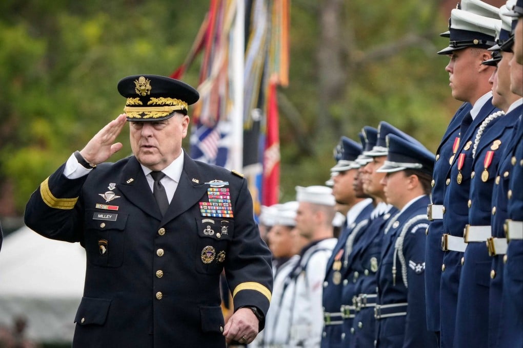 Outgoing Chairman of the Joint Chiefs of Staff General Mark Milley inspects the troops in Arlington, Virginia, on Friday. Photo: Getty Images via AFP
