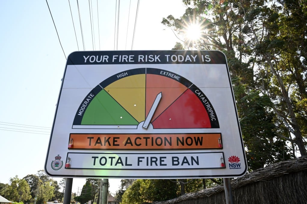 A bushfire danger advisory sign shows extreme fire risk and a total fire ban in Dural, north west of Sydney, Australia. Photo: EPA-EFE