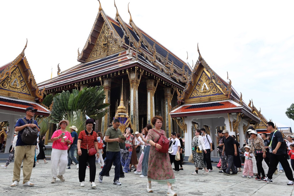 Chinese tourists visit the Emerald Buddha Temple inside the Grand Palace in Bangkok, Thailand. Photo: EPA-EFE