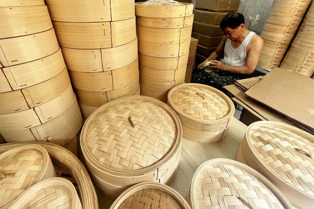 Lam Ying-hung applies the finishing touches to a small bamboo steamer at the Tuck Chong Sum Kee Bamboo Steamer Company. Chefs in Hong Kong share why traditional bamboo steamers are so important for meals like dim sum. Photo: Kylie Knott