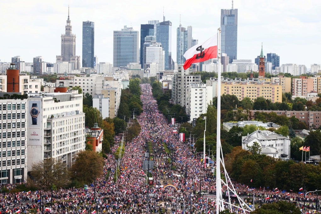 A dense parade of participants marched through Warsaw, carrying banners. Photo: dpa