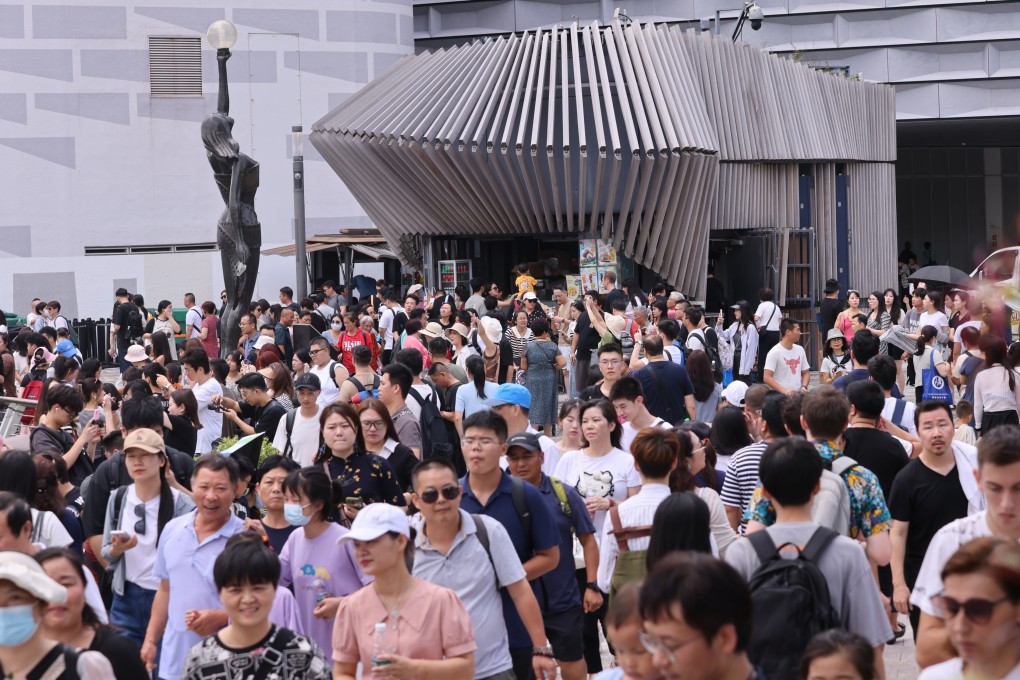 Tourists enjoy a stroll along the popular Avenue of Stars in Tsim Sha Tsui.Photo: May Tse