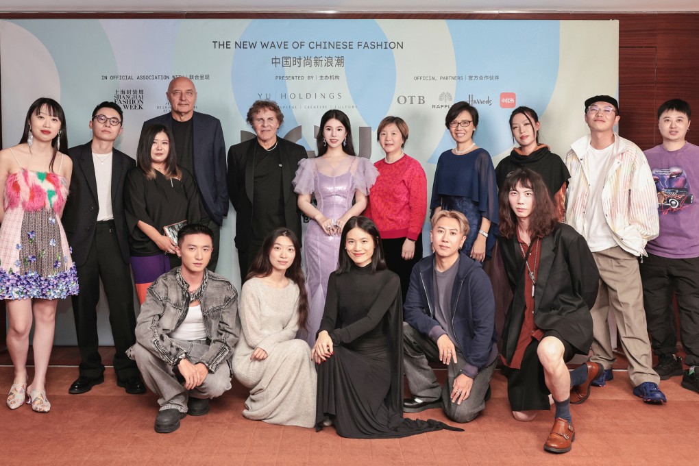 Wendy Yu (centre back) and others at the Yu Prize cocktail event. The entrepreneur and investor co-hosted an event at the start of Paris Fashion Week to toast rising Chinese designers. Photo: Yu Holdings
