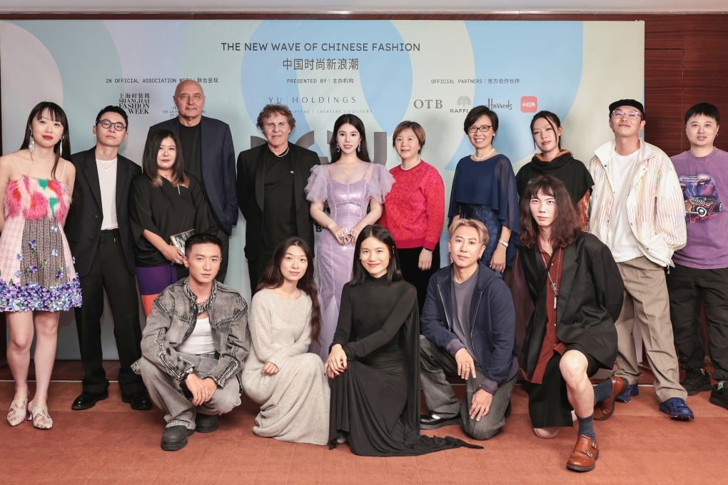 Wendy Yu (centre back) and others at the Yu Prize cocktail event. The entrepreneur and investor co-hosted an event at the start of Paris Fashion Week to toast rising Chinese designers. Photo: Yu Holdings
