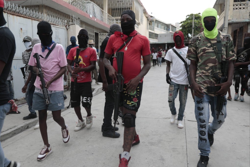 Armed gang members of ‘G9 and Family’ in Port-au-Prince, Haiti. Photo: AP