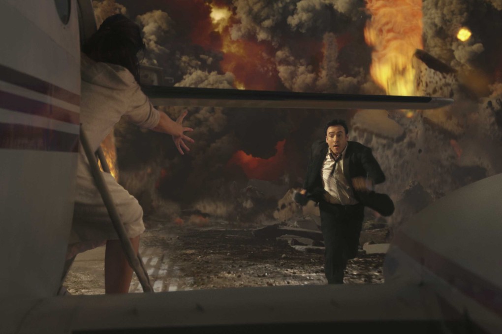 John Cusack plays a failed writer who tries to save his family as the world ends in “2012” (2009). Roland Emmerich’s apocalyptic drama broke box-office records in China, but why?
