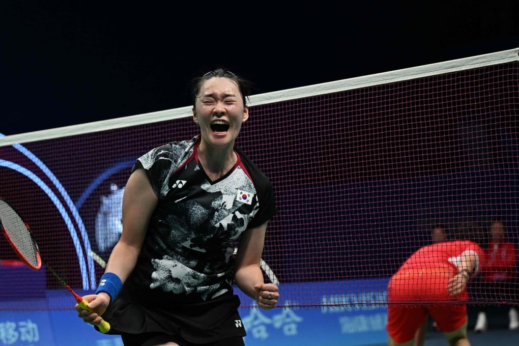 South Korea’s Kim Ga-eun reacts after beating China’s He Bingjiao to secure gold in the women’s team badminton final at the Asian Games in Hangzhou. Photo: AFP