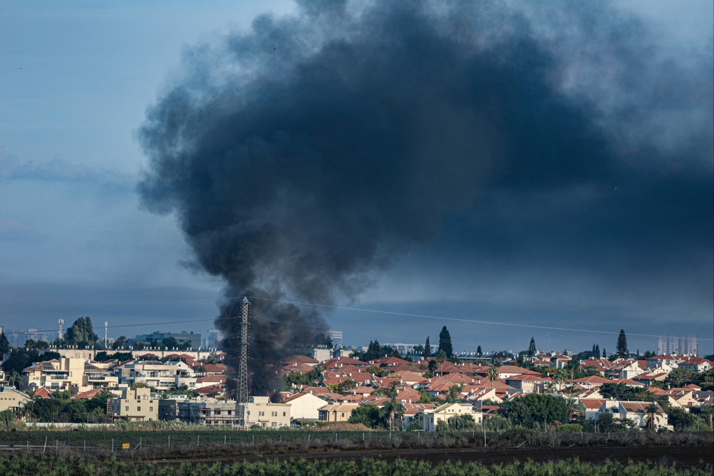Smoke billows from Israel following a rocket attack from Gaza City on Saturday. Photo: dpa