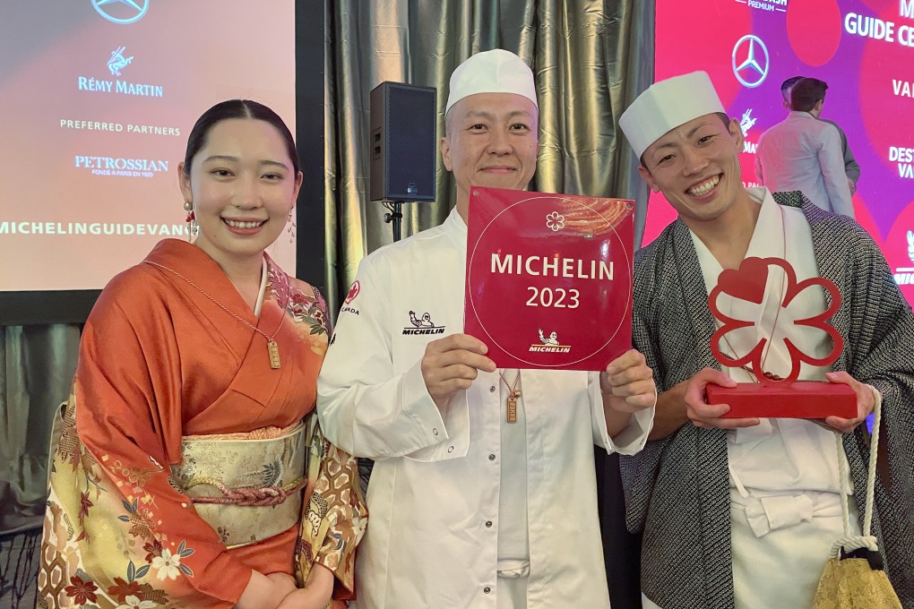 Okeya Kyujiro’s executive chef Yuki Anai (centre) accepts the restaurant’s Michelin star award with other members of the team at the ceremony to announce the Michelin Guide Vancouver 2023. Photo: Bernice Chan