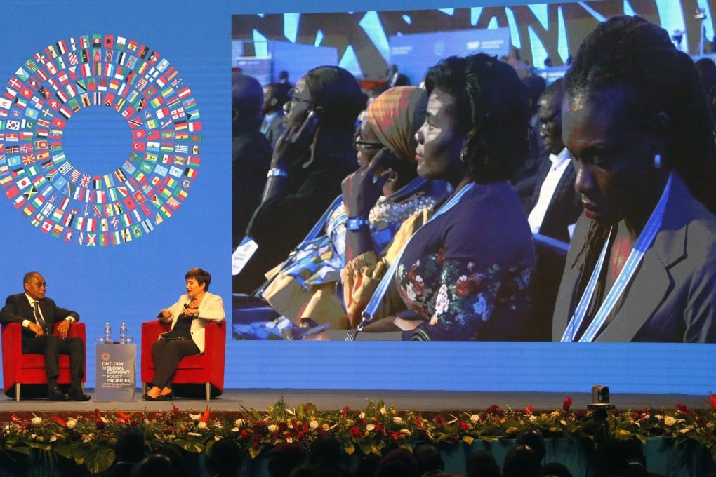 International Monetary Fund managing director Kristalina Georgieva (right) speaks to Ivorian Minister of Economy and Finance Adama Coulibaly during the curtain-raising ceremony of the annual meetings of the IMF and World Bank in Abidjan, Ivory Coast, on October 5. The annual meetings of the two institutions will be held in Marrakech, Morocco, from October 9 to 15. Photo: EPA-EFE