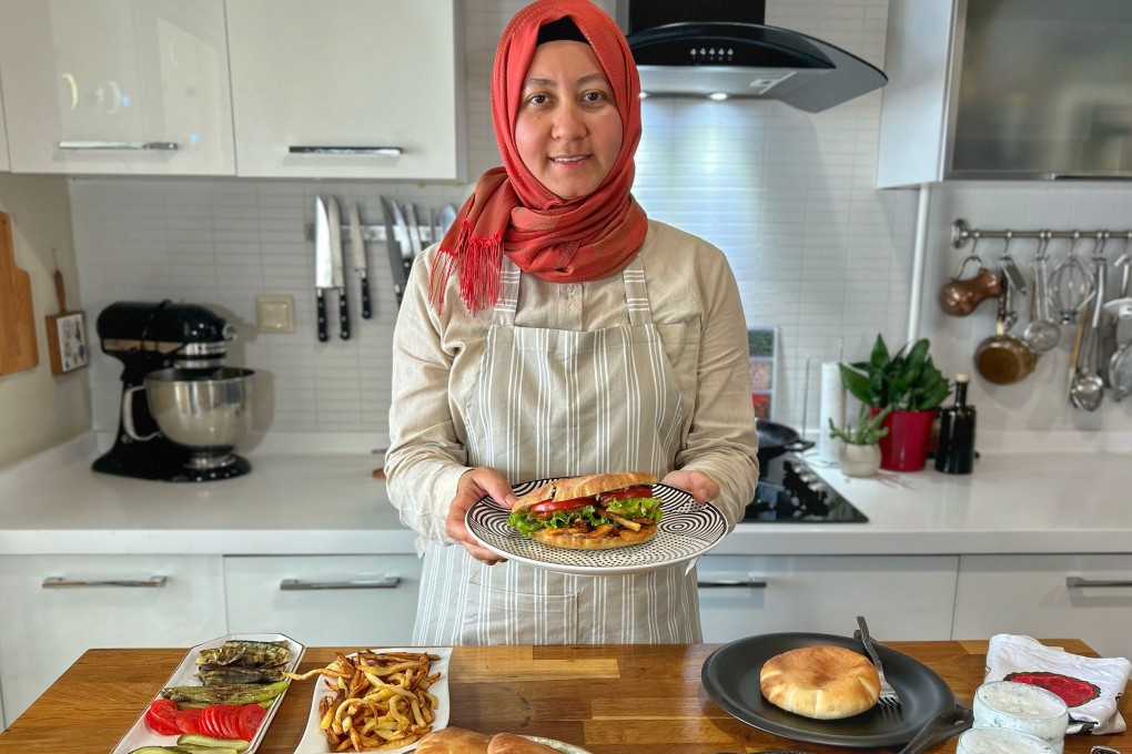 Aysenur Altan at her home in Istanbul preparing food. Altan’s English-language YouTube channel, Turkish Food Travel, reveals Turkey to the world. Photo: courtesy Aysenur Altan