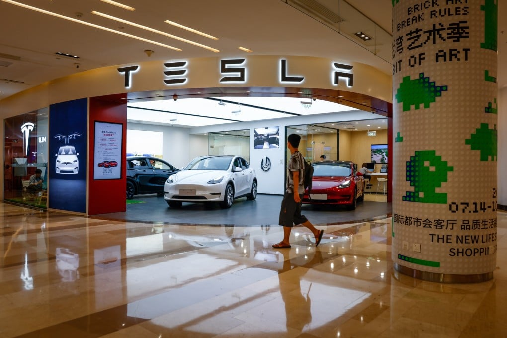 A Tesla showroom in Beijing. The American giant plans to start delivering its revamped Model 3 this month. Photo: EPA-EFE