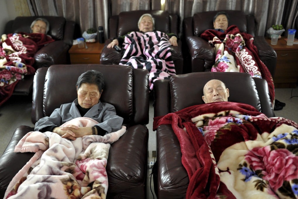 Elderly people take a nap at a day care center in Shanghai. China’s ageing population is expected to take up a greater share of the total, with life expectancy projected to be over 80 years by 2035. Photo: AP