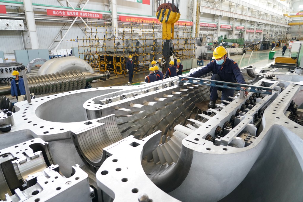 An engineer assembles an axial-flow compressor at a workshop of the Shaanxi Blower (Group) Co., Ltd., a state-owned enterprise, in Xi’an, northwest China’s Shaanxi Province, Nov. 18, 2020. State-owned enterprises have continued to take primacy in China’s economy. Photo: Xinhua
