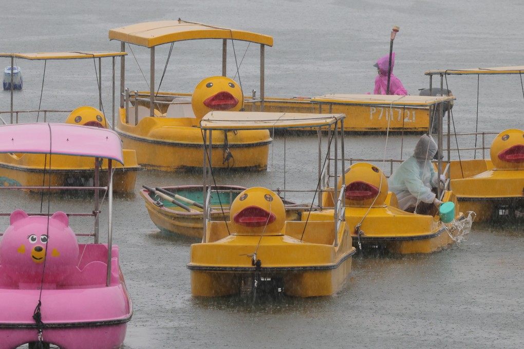 Boaters handle pedal boats moored at the pier in Tai Mei Tuk as Typhoon Koinu hit Hong Kong on October 9. Photo: Jelly Tse
