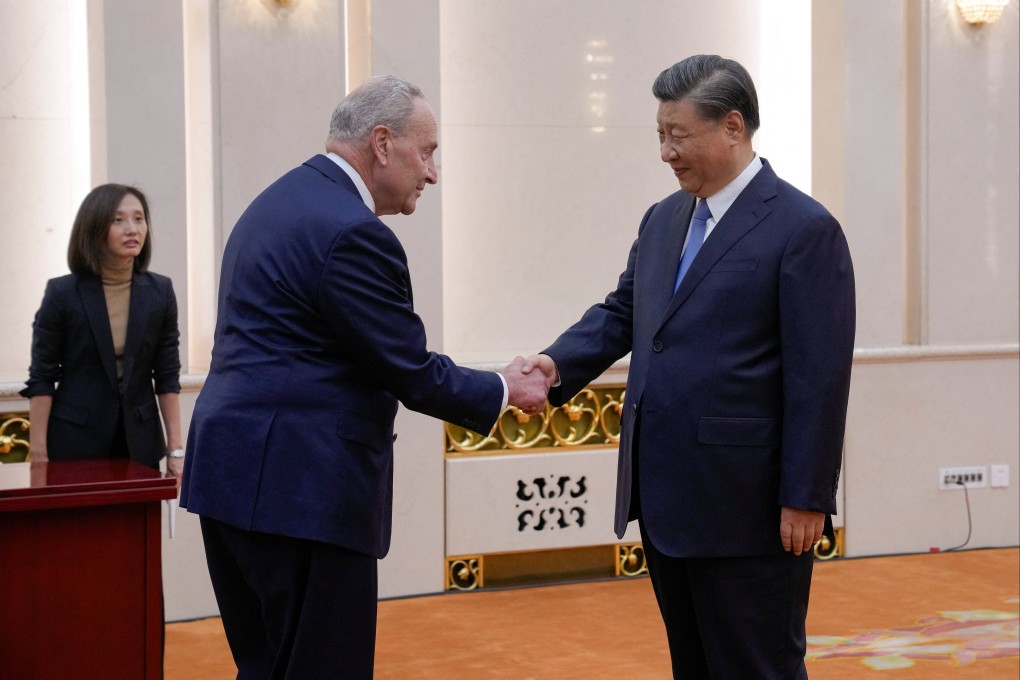 US Senate Majority Leader Chuck Schumer is greeted by Chinese President Xi Jinping before their meeting at the Great Hall of the People in Beijing on October 9. Photo: Reuters