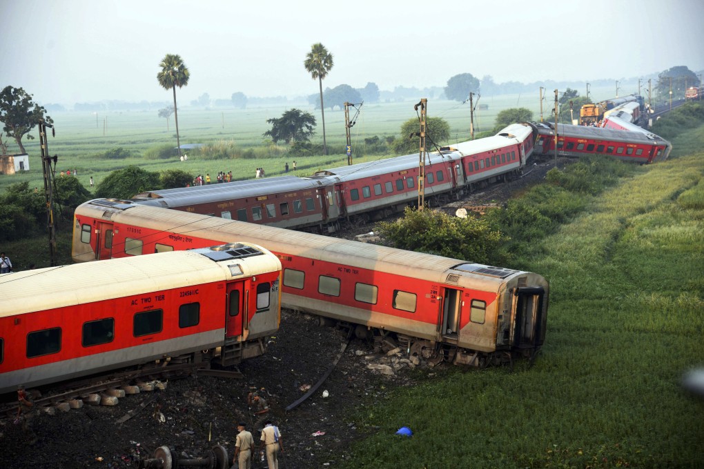 Coaches of the North-East Express passenger train that derailed in Bihar state, India. Photo: AP
