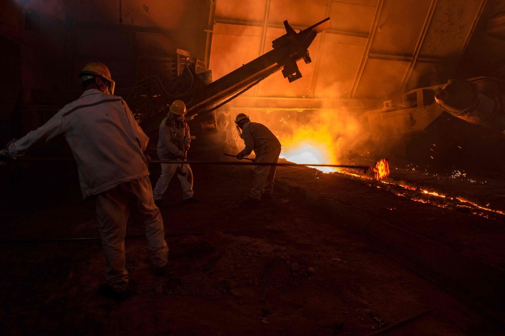 Steel workers in Huai’an, Jiangsu province. The EU is poised to launch an inquiry into Chinese subsidies in the sector, sources said. Photo: AFP