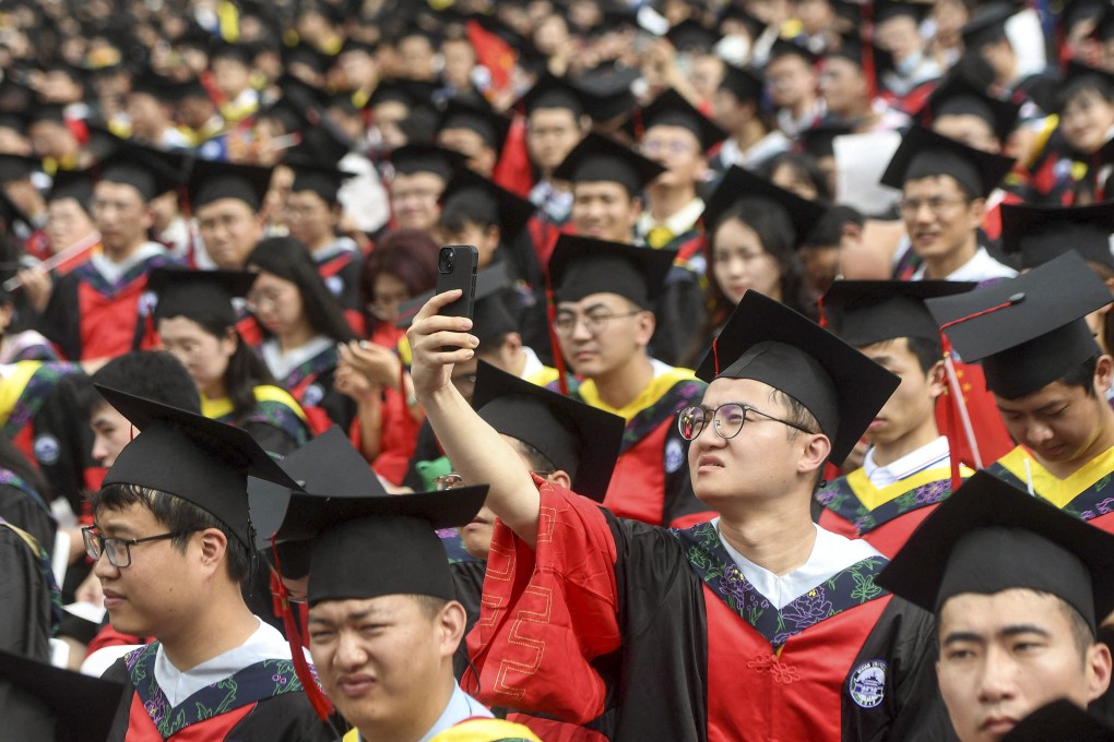 Students at China’s Wuhan University attend a graduation ceremony in June. Photo: AFP