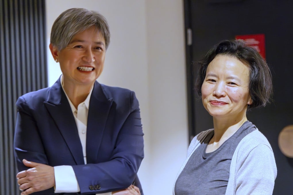 Chinese Australian journalist Cheng Lei, right, poses with Australia’s Minister for Foreign Affairs, Penny Wong on Wednesday. Cheng, who was convicted on espionage charges and detained in China for three years has returned to Australia. Photo: AP