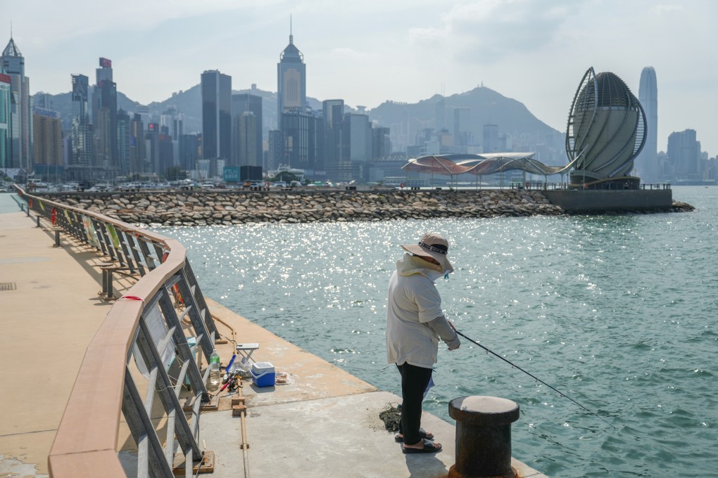 A person braves a hot, sunny afternoon fishing at East Coast Park Precinct in Hong Kong Island’s North Point district on October 5, 2023. Photo: Sam Tsang