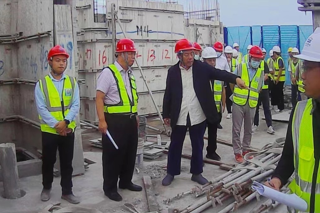 Yang Guoqiang (centre, in black), co-founder of embattled Chinese developer Country Garden, visits a construction site in Guangdong on October 11, 2023. Photo: Handout