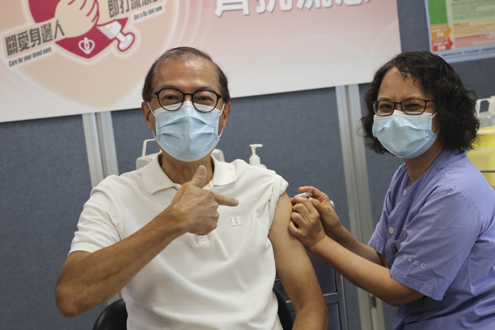 Hong Kong Health Secretary Lo Chung-mau receives his seasonal influenza vaccination at the Sai Wan Ho General Out-patient Clinic. Photo: Yik Yeung-man