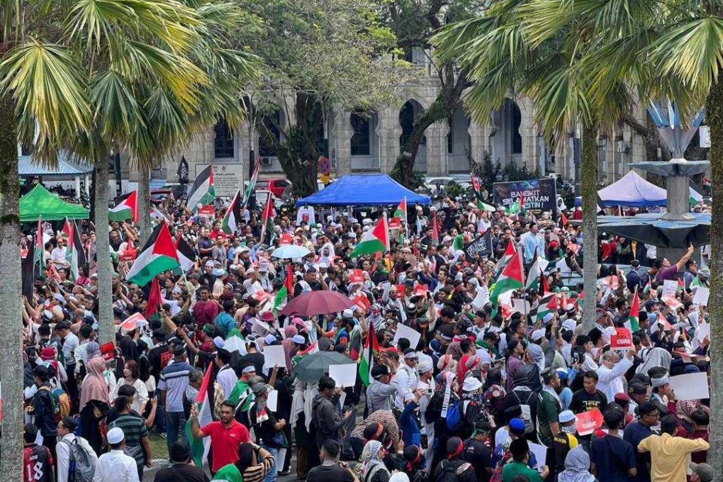Malaysian Muslims denounce Israel’s military action in Gaza during a rally outside a mosque in Kuala Lumpur on Friday. Photo: Hadi Azmi