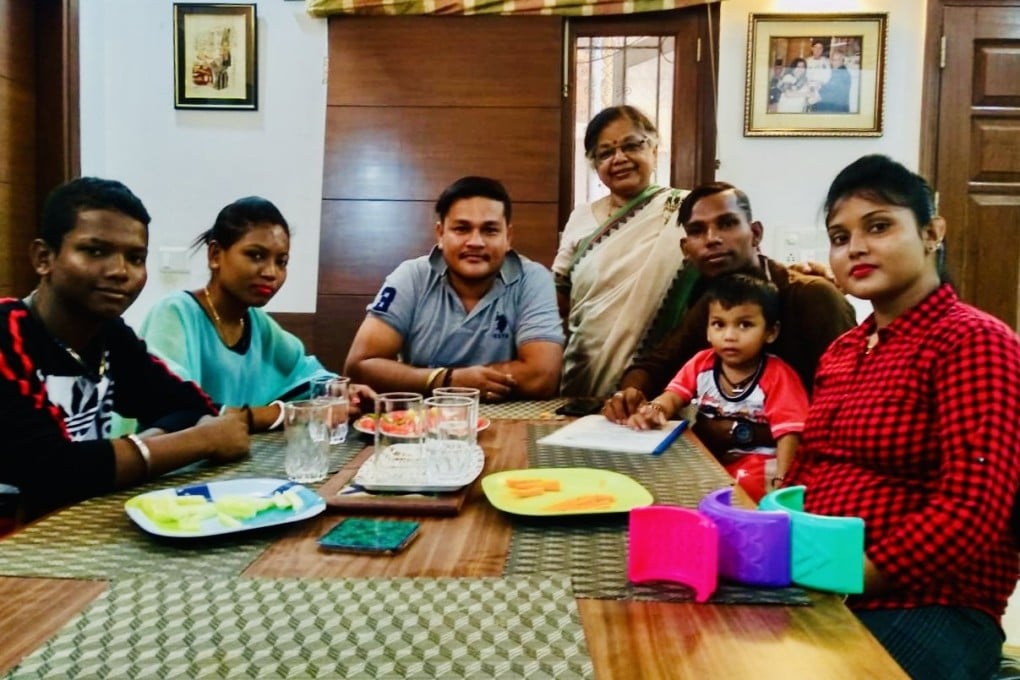 Linguist Anvita Abbi, right, with a Great Andamanese family at her home in New Delhi, India. Photo: Anvita Abbi