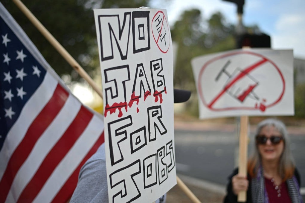 Workers protesting against a US government mandate requiring all federal employees to receive the Covid-19 vaccine. Photo: AFP